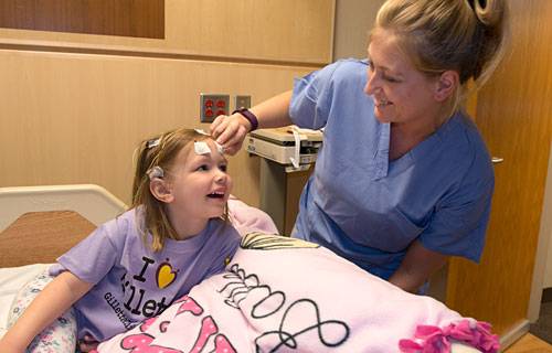 Children like Sophie can bring their favorite blanket, stuffed animals, or toys during their stay at Gillette for neurodiagnostic testing.