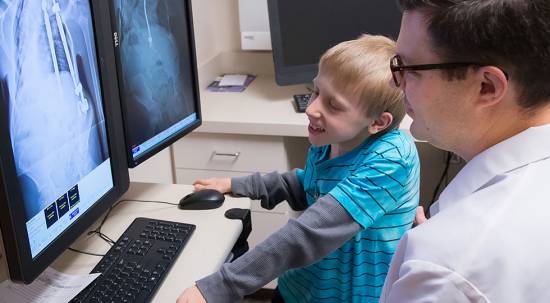Gillette spine patient Joshua with Tenner Guilluame, MD