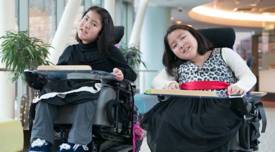 Neuromuscular disease patients kiara and keisy at Gillette children's