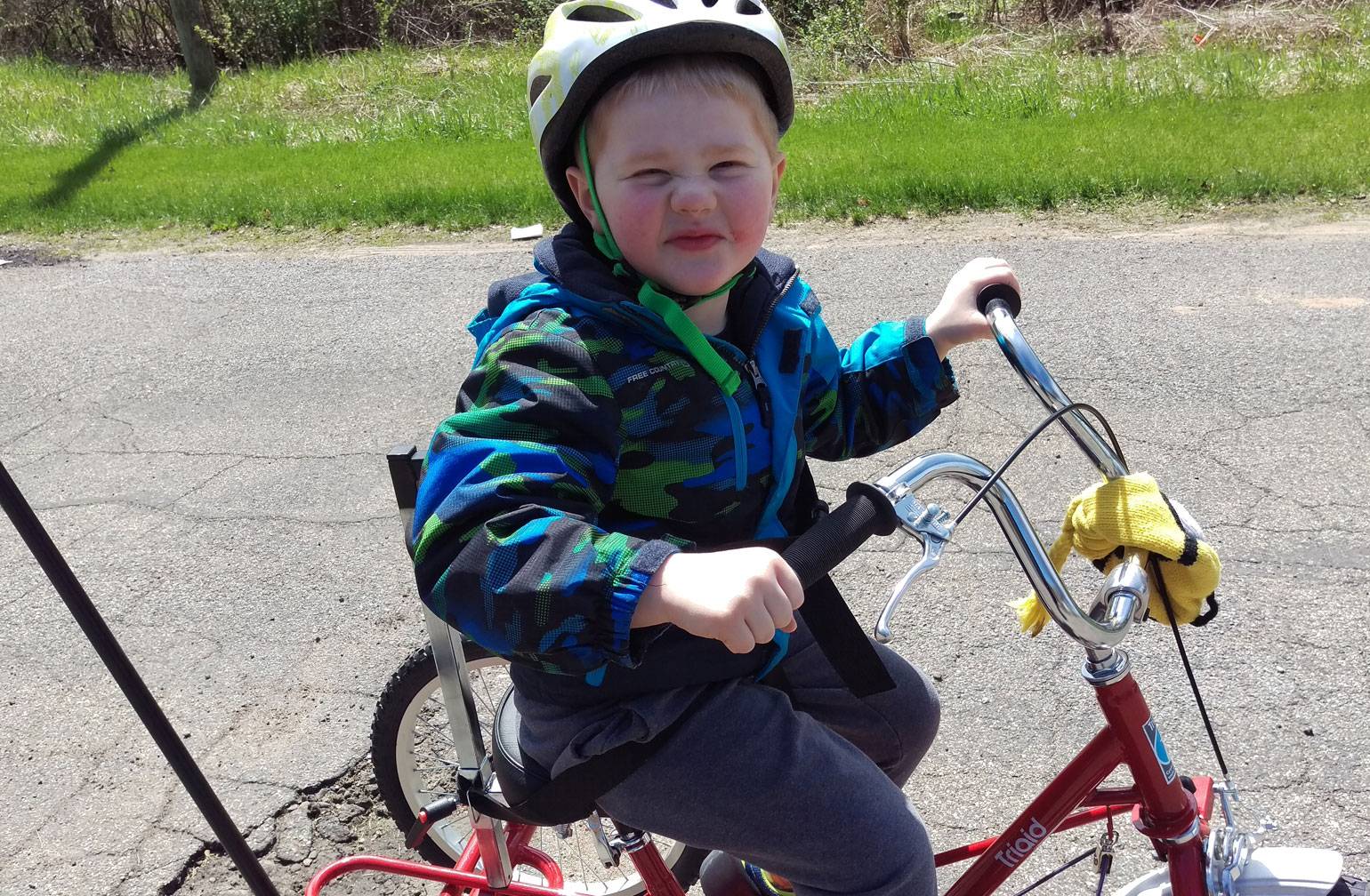 Gavin takes his new adapted bike for a spin